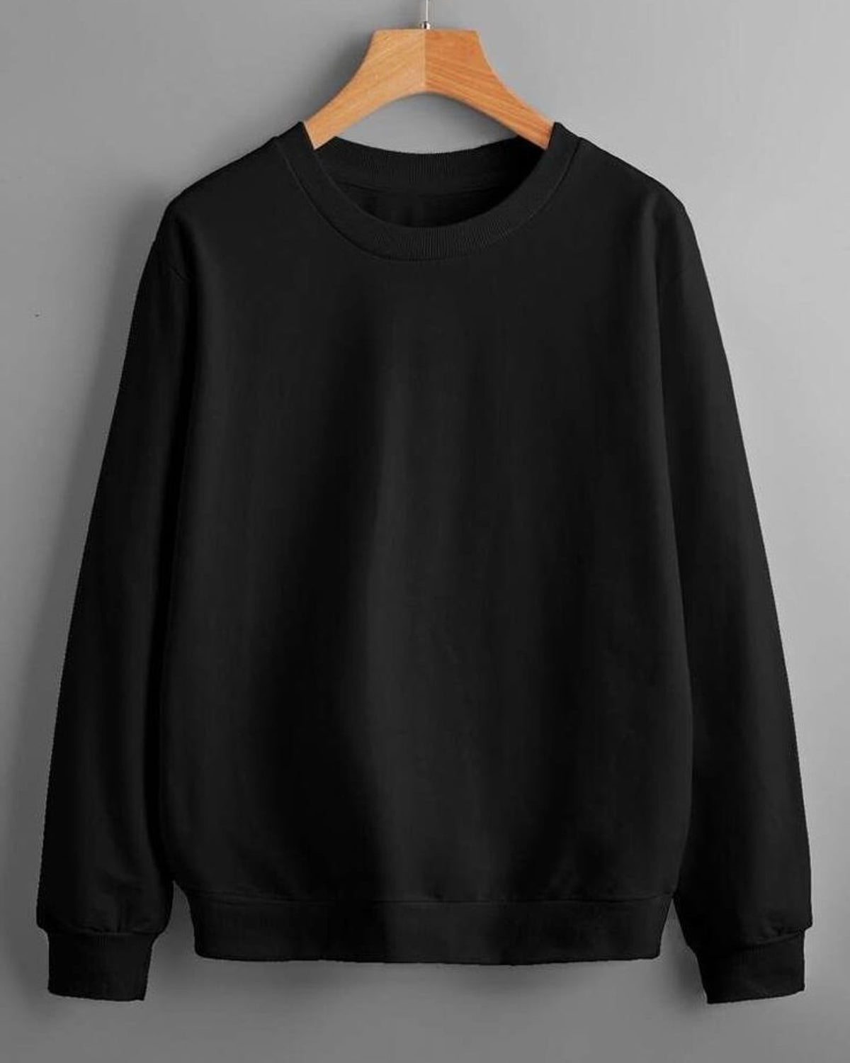 LUSH crewneck sweatshirt in Black on a hanger