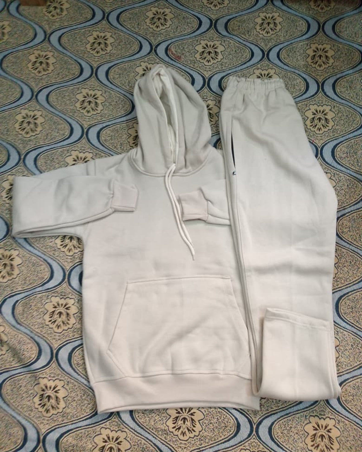 LUSH tracksuit set in Cream: pullover hoodie with kangaroo pocket beside matching trousers with elastic waist