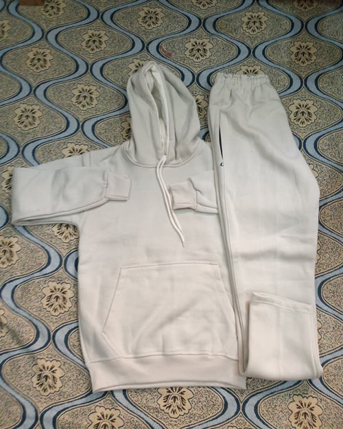 LUSH tracksuit set in Cream: pullover hoodie with kangaroo pocket beside matching trousers with elastic waist